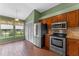 Eat-in kitchen features stainless steel appliances and natural light at 10143 Pink Carnation Ct, Orlando, FL 32825