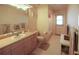 Simple bathroom featuring vanity, toilet, shower/tub combo, and tile flooring at 11923 Lake Butler Blvd, Windermere, FL 34786