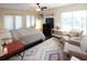 Comfortable bedroom with light walls, ceiling fan, and a cozy rug to brighten the space at 11923 Lake Butler Blvd, Windermere, FL 34786