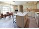 Bright eat-in kitchen with a central island, tile flooring, and a dining area at 11923 Lake Butler Blvd, Windermere, FL 34786