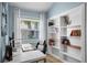 Bright and spacious office space featuring white built-in shelving at 125 W Wyndham Ct, Longwood, FL 32779