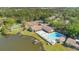 Aerial view of Lake of the Woods pool and tennis courts at 136 Teriwood Ct, Fern Park, FL 32730