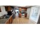 Well-lit kitchen features tile floors, granite countertops, and stainless steel appliances at 136 Teriwood Ct, Fern Park, FL 32730