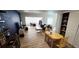 Spacious living room boasting light wood floors, neutral walls, a dining area, and plenty of natural light at 136 Teriwood Ct, Fern Park, FL 32730