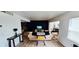 Open living room featuring light wood floors, neutral walls, modern furniture and a bright open floor plan at 136 Teriwood Ct, Fern Park, FL 32730