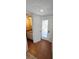 Convenient powder room featuring tile flooring and an entry door to the exterior, adding practicality at 136 Teriwood Ct, Fern Park, FL 32730