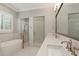 Luxurious bathroom featuring a soaking tub, double shower, and sleek finishes for a spa-like experience at 1361 Palmer Ave., Winter Park, FL 32789