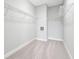 Walk-in closet with carpet flooring and wire shelving on the walls at 14208 Shocklach Dr, Winter Garden, FL 34787