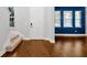 Welcoming foyer with gleaming hardwood floors and staircase at 14208 Shocklach Dr, Winter Garden, FL 34787