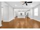 Open-concept living room flows into a spacious kitchen with modern appliances at 14208 Shocklach Dr, Winter Garden, FL 34787