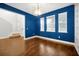 Elegant living room with hardwood floors and a view of the staircase at 14208 Shocklach Dr, Winter Garden, FL 34787