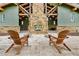 Stone fireplace located in the open-air community pavilion with lounge seating at 14208 Shocklach Dr, Winter Garden, FL 34787