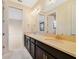 Bright bathroom with dual vanities, modern fixtures, and a clean design at 14516 Sunbridge Cir, Winter Garden, FL 34787