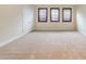 Bedroom with plush carpet, double door closet, and plantation shutters at 14516 Sunbridge Cir, Winter Garden, FL 34787