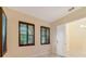 Bedroom featuring natural light with multiple windows and plantation shutters at 14516 Sunbridge Cir, Winter Garden, FL 34787