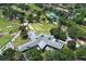 An aerial view of the Rio Pinar Golf & Country Club with lush greenery and a well-maintained golf course at 1529 Ensenada Dr, Orlando, FL 32825