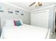 Bedroom features neutral colors, large bed, and a closet for efficient storage at 1529 Ensenada Dr, Orlando, FL 32825