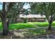 Beautiful home with a well-kept lawn, shrubbery, and a welcoming entrance at 1529 Ensenada Dr, Orlando, FL 32825