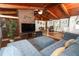 Cozy living room with wood floors, fireplace, and views of the dining area at 1529 Ensenada Dr, Orlando, FL 32825