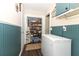 Walk-in pantry providing ample storage, with shelving stocked with supplies for modern living at 1529 Ensenada Dr, Orlando, FL 32825