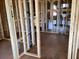 Framed bathroom highlighting the plumbing and electrical components during construction at 15447 Hamlin Park Drive, Winter Garden, FL 34787