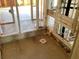 Spacious framed bathroom ready for finishing, showcasing plumbing and construction details at 15447 Hamlin Park Drive, Winter Garden, FL 34787