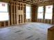 Interior view of new construction featuring framed walls, wiring, plumbing and windows at 15447 Hamlin Park Drive, Winter Garden, FL 34787