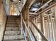 Unfinished stairs and exposed ductwork visible in the new construction home at 15447 Hamlin Park Drive, Winter Garden, FL 34787