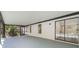Spacious screened patio with view of the backyard pool through the large glass doors at 1633 Pinehurst Dr, Casselberry, FL 32707