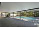 Screened-in pool with an attached hot tub and spacious deck at 1633 Pinehurst Dr, Casselberry, FL 32707
