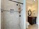 Elegant bathroom with tiled shower, rainfall shower head and vanity at 19123 Sheldon St, Orlando, FL 32833