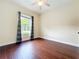 Bright bedroom with large window and hardwood floors, offering a serene atmosphere at 19123 Sheldon St, Orlando, FL 32833
