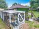 Exterior view of chicken coop and surrounding backyard at 19123 Sheldon St, Orlando, FL 32833