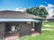 Exterior shot of a backyard shed, complete with brick pavers and a metal roof at 19123 Sheldon St, Orlando, FL 32833