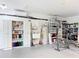 Functional garage with built-in shelving, a utility sink, and space for various storage and work needs at 19123 Sheldon St, Orlando, FL 32833