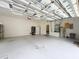Expansive garage featuring high ceilings and convenient access to laundry facilities at 19123 Sheldon St, Orlando, FL 32833