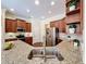 A fully equipped kitchen featuring granite counters, stainless appliances, and ample cabinet space at 19123 Sheldon St, Orlando, FL 32833
