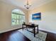 Charming office with arched window, offering a bright and comfortable workspace with beautiful views at 19123 Sheldon St, Orlando, FL 32833