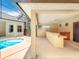 The screened in pool area features an outdoor kitchen and bar, creating the perfect oasis for relaxation and entertainment at 19123 Sheldon St, Orlando, FL 32833