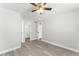 Open bedroom boasts a ceiling fan and doors to the bathroom and walk-in closet at 1932 Lake Atriums Cir # 69, Orlando, FL 32839