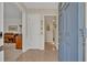Inviting foyer featuring parquet wood flooring and a glimpse into the living spaces at 2040 Mohawk Trl, Maitland, FL 32751