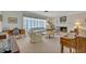 Cozy living room showcasing a fireplace, comfortable seating, and ample natural light at 2040 Mohawk Trl, Maitland, FL 32751