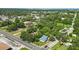 Aerial view of a property featuring nearby streets, homes, and an open area at 205 S Highland Ave, Apopka, FL 32703