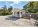 Inviting one-story home with a classic white picket fence, handicap access and front porch at 205 S Highland Ave, Apopka, FL 32703