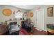 Salon room with stylist chairs, hair washing sinks, product display, and exit door at 205 S Highland Ave, Apopka, FL 32703