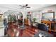 Bright salon interior with hardwood floors, salon stations, and stylish decor at 205 S Highland Ave, Apopka, FL 32703