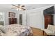 A bedroom features hardwood floors, closet and ceiling fan at 2109 Montana St, Orlando, FL 32803