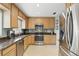 Well-equipped kitchen featuring stainless steel appliances and granite countertops at 2109 Montana St, Orlando, FL 32803