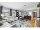 Spacious living room with hardwood floors, ample seating, and neutral color scheme at 2109 Montana St, Orlando, FL 32803