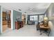 Inviting living room with comfortable seating, wood accents, and views of the kitchen at 2109 Montana St, Orlando, FL 32803